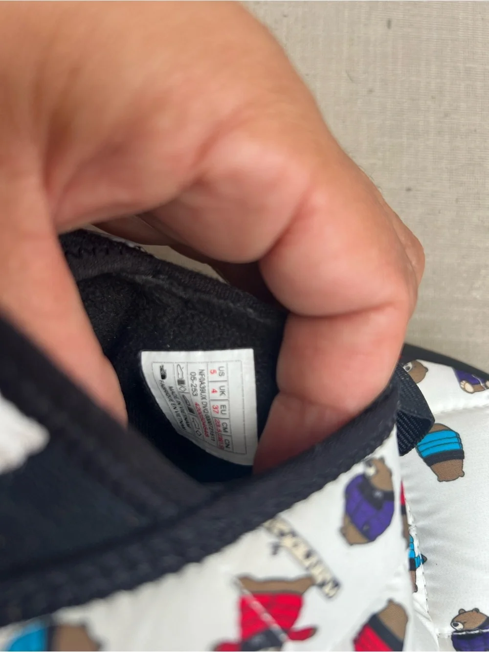 The North Face White Quilted Slip-On Slippers with Multicolor Bear Print